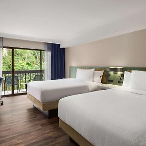 Two Queen Beds Balcony Bathtub Disability Access